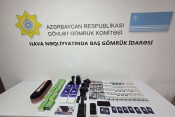 Mobil telefonlarda gizlədilən qızıl külçələr aşkarlandı - FOTOLAR | FED.az