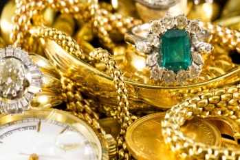 Bu nazirliyin əməkdaşı 18 kq qızılla tutuldu - Evindən silah çıxdı