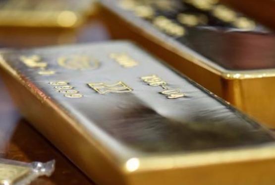 Золото торгуется у 6-месячного минимума на фоне растущего доллара США